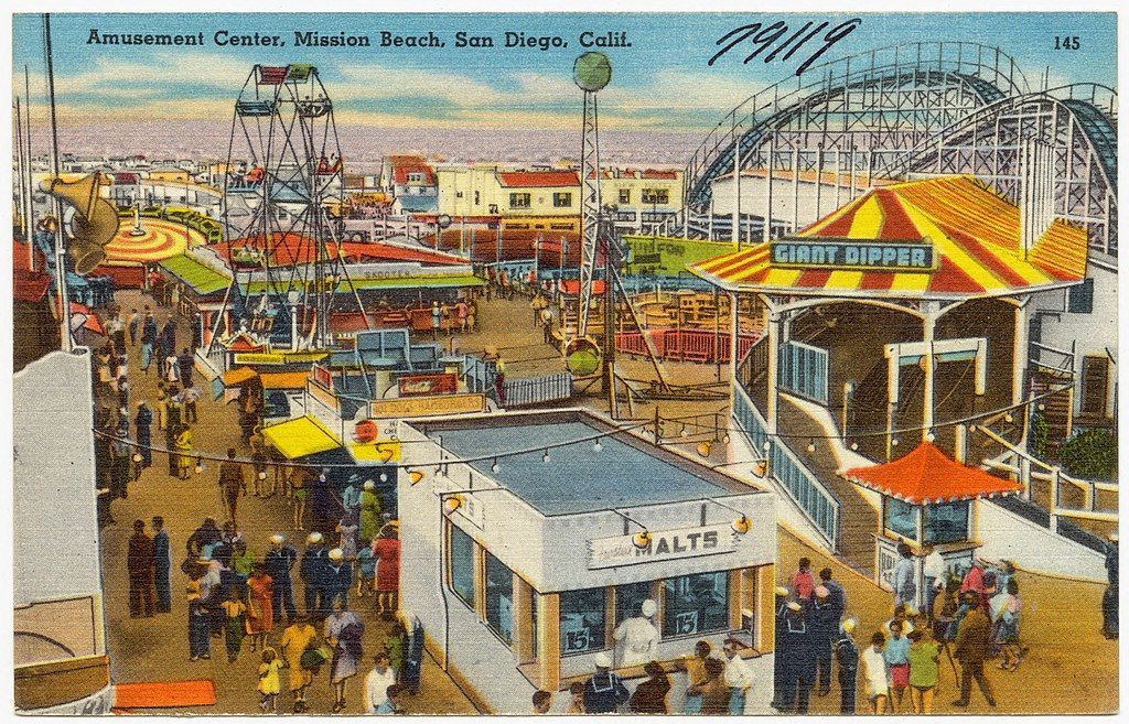 A postcard of a beachfront amusement park at Mission Beach in San Diego celebrates leisure time in sunny California in the 1930s or 1940s.