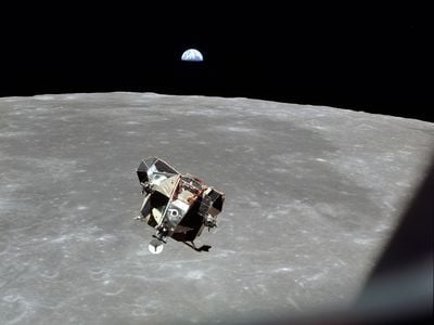 The lunar module Eagle, carrying Neil Armstrong and Buzz Aldrin, ascends back up to the command module Columbia with Michael Collins. It is often said that Michael Collins is the only human, living or dead, who is not in this photograph.