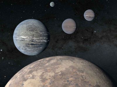 An artist's rendering of the five-planet system that orbits star HD 108236, or TOI-1233. In the foreground is a hot, rocky planet that resembles Earth.